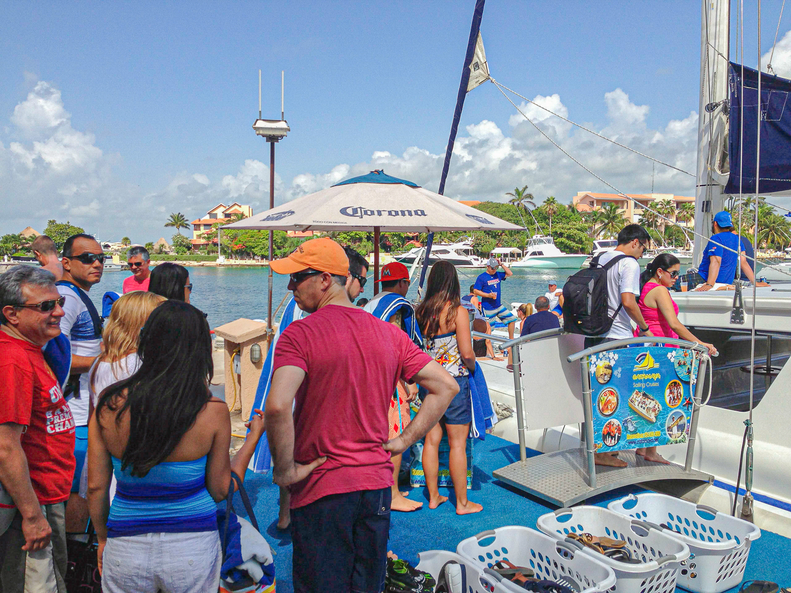Tourists boarding a Catamaran in Puerto Aventuras, Mexico